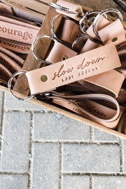 Slow Down Look Around Leather Keychain